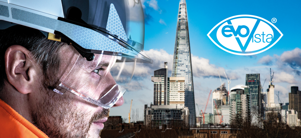 A picture of a contruction worker looking east wearing a JSP EVO® VISTALens® safety helmet with The Shard, London, in the background