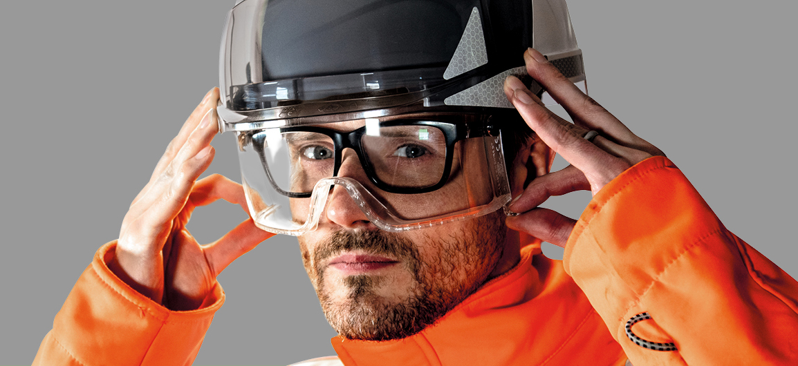 An image of prescription eyewear being safely worn beneath an EVO® VISTA® safety helmet